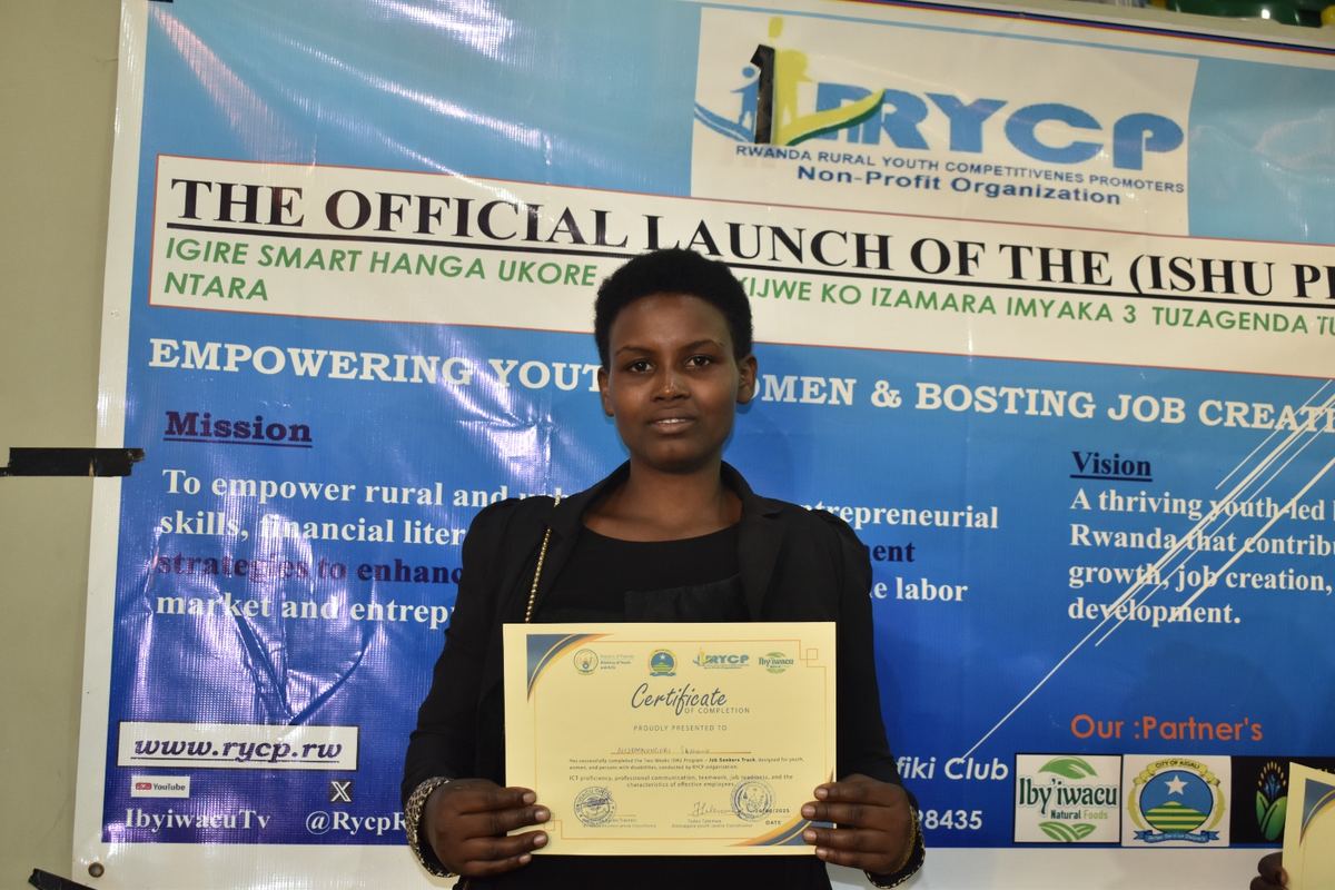 A certified creative entrepreneur holding her certificate